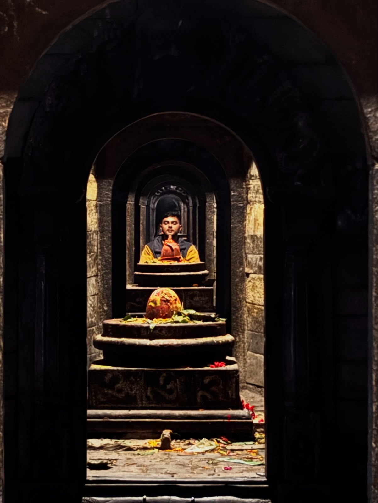 Shivalinga shrines through a series of stone arches at Pashupatinath