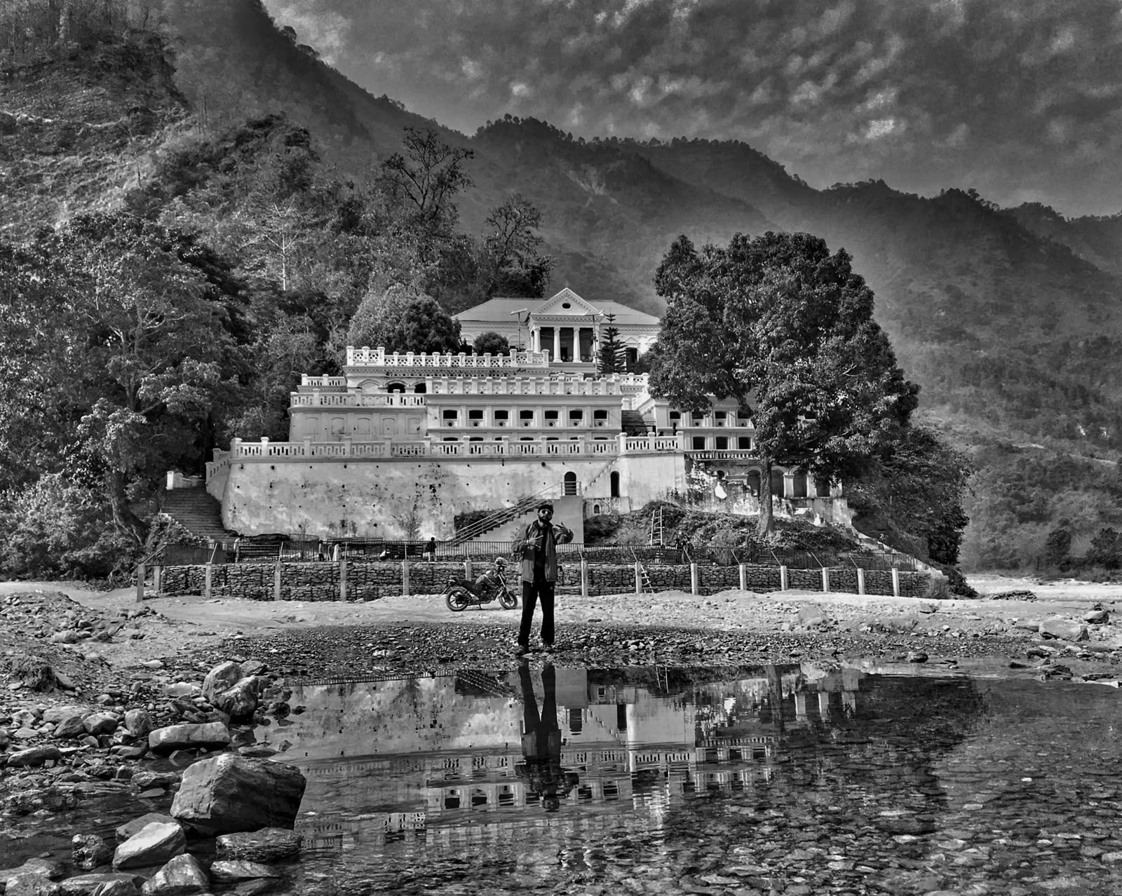 Rani Mahal palace reflected in the river, black and white